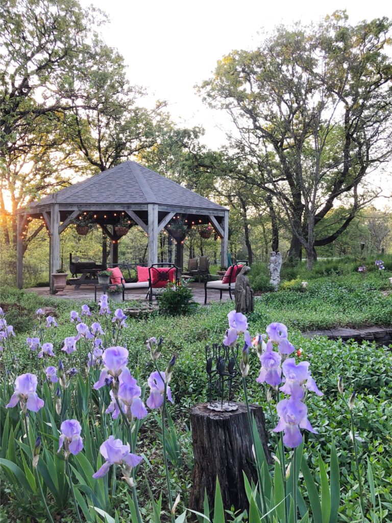 Large gazebo surrounded by lush grounds