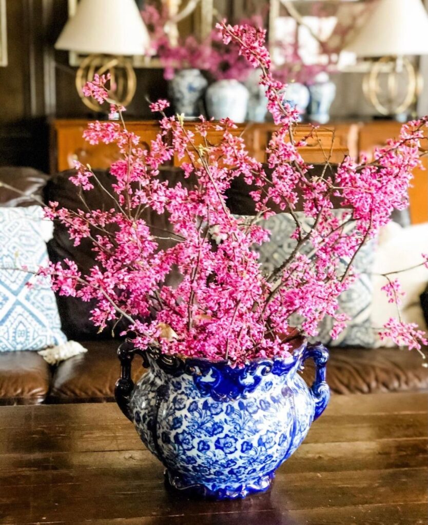 Antique blue and white haynes balt pottery with redbud stems