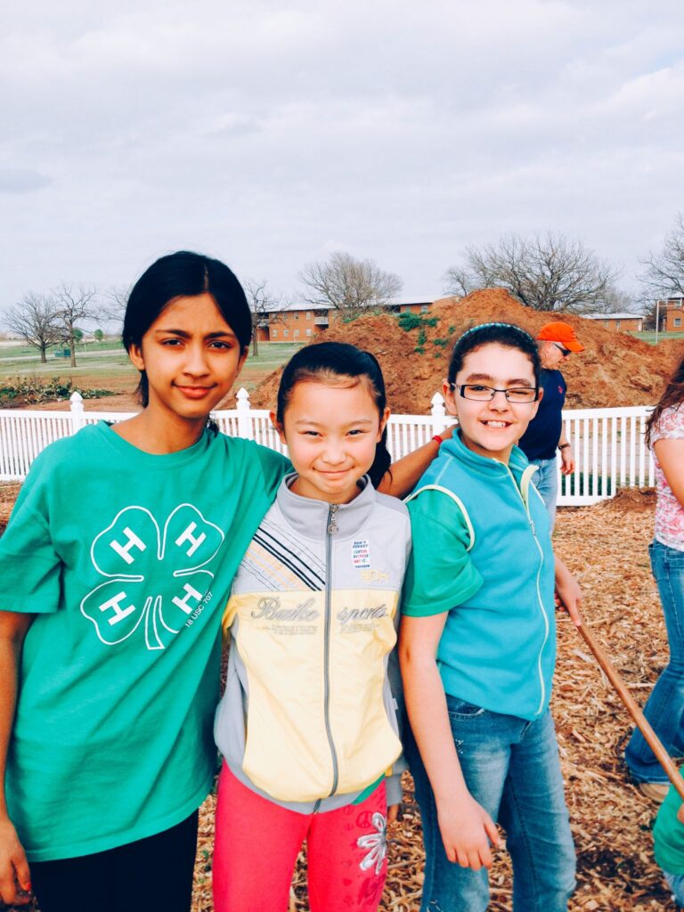 Some of our 4-Hers learning how to garden with cool season vegetables