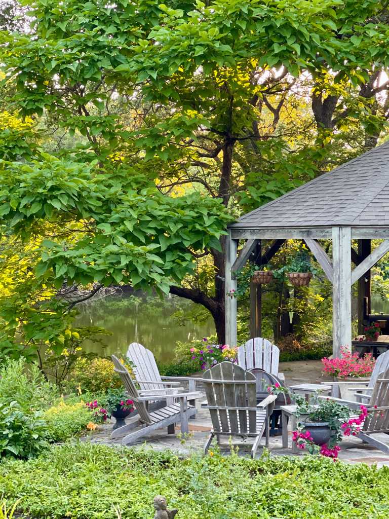 Our backyard garden includes a firepit, gazebo and large pond.